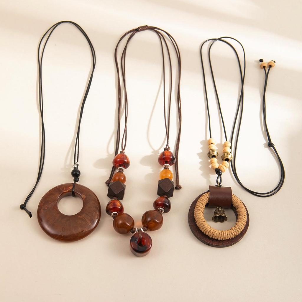 Antique Bronze Feather Necklace: Bohemian Double-Layer Zen Style for Women
