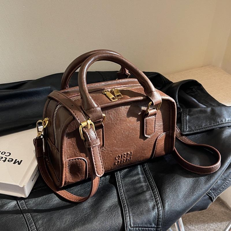 Die heute beliebten kleinen Taschen sind vielseitig im Sommer und Winter, neue Retro-Mode-Umhänge-Messenger-Taschen, tragbare Kissen-Taschen.