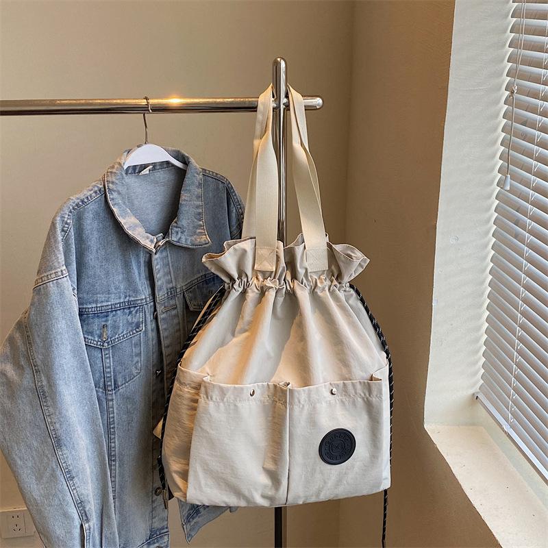 Multifunctional Travel Bag Shoulder Tote Bag Female Drawstring Backpack New Large Capacity Lightweight Waterproof Backpack