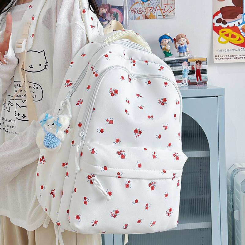 New backpack female Korean college students small floral literary and art fan schoolbag ins college style casual backpack