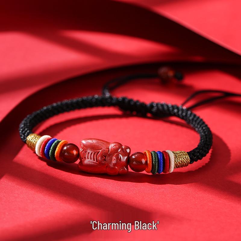 

Dragon Knot Vermilion Bracelet: Red String Woven Cord with Golden Inscription, Unique Design for Men & Women.