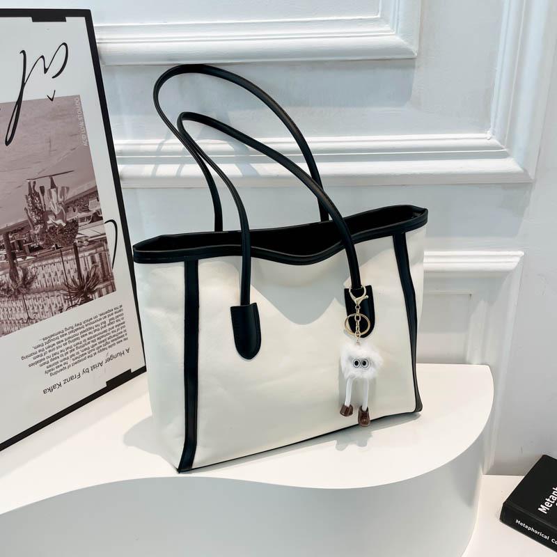 

New fashion casual large-capacity commuting simple versatile tote bag retro trend temperament shoulder bag women no pendant чорний