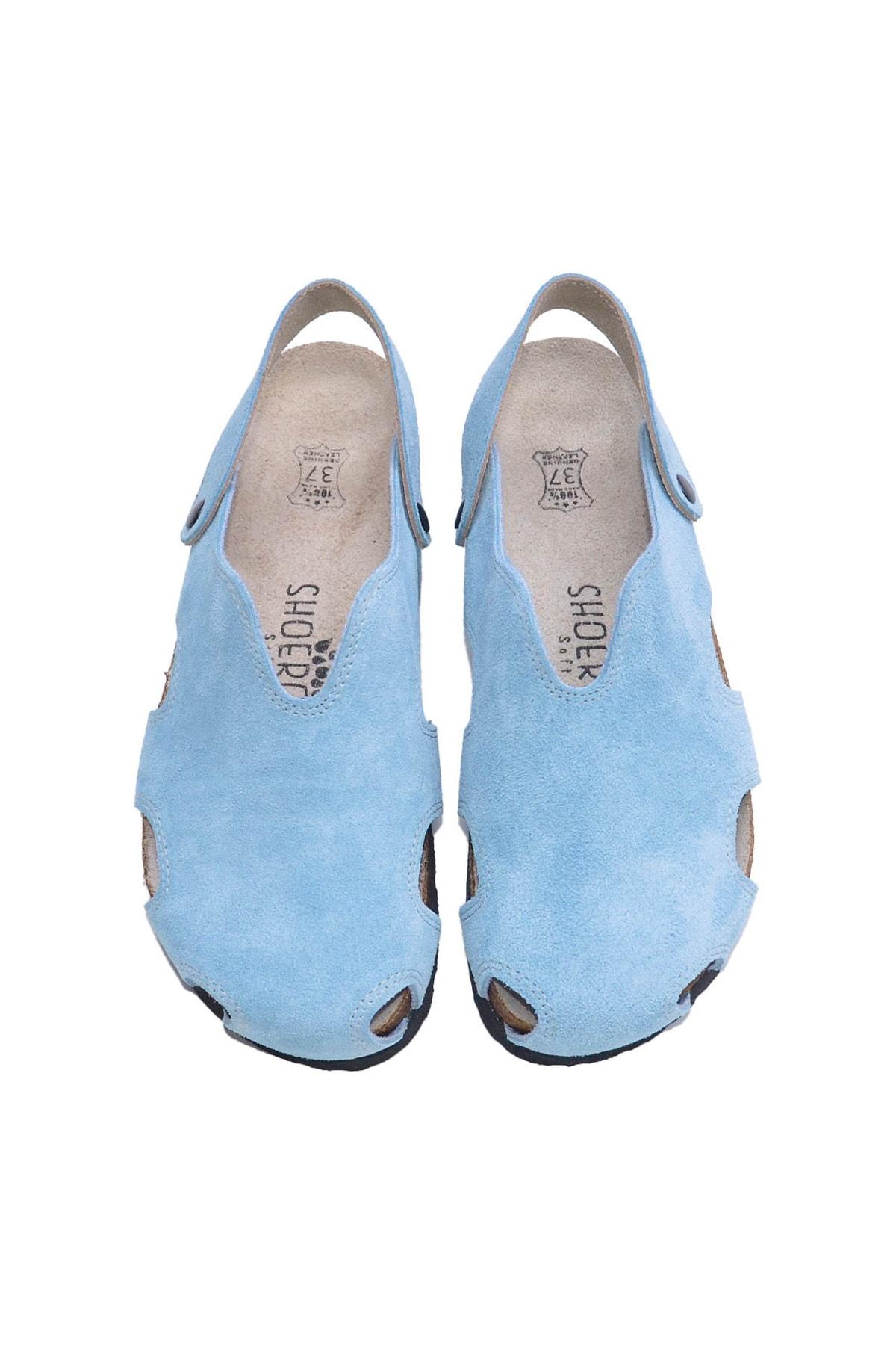 

Сандалии на плоской подошве из замши синего цвета