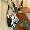Large-capacity Relaxed Fabric Cat Shoulder Crossbody Bag with Design Appeal