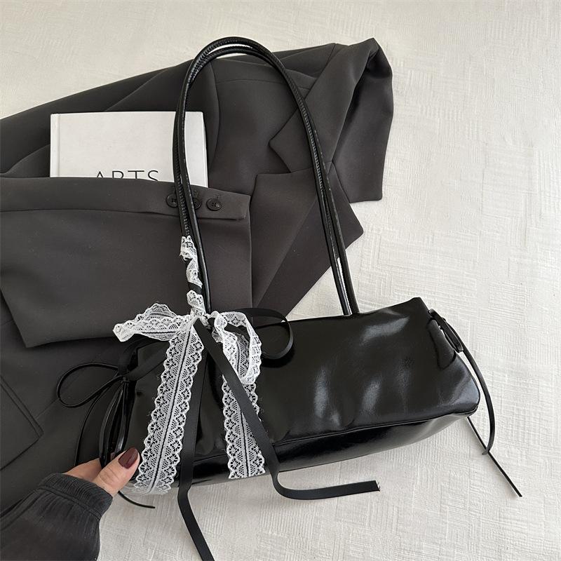 Korean version of simple ins baguette bag women's 2025 new trendy versatile commuter shoulder bag casual bow armpit bag