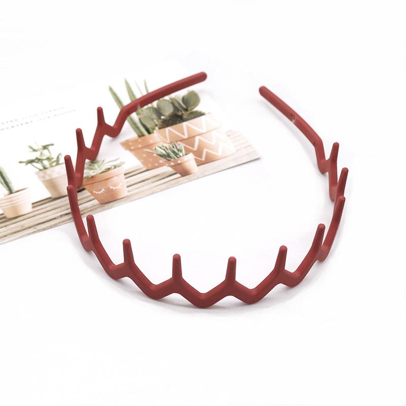 Buntes, wellenförmiges koreanisches Zahnkamm-Haarband - Rutschfest, schonend zum Haar, Bequemer Sitz, Ideal zum Bändigen von Babyhaaren.