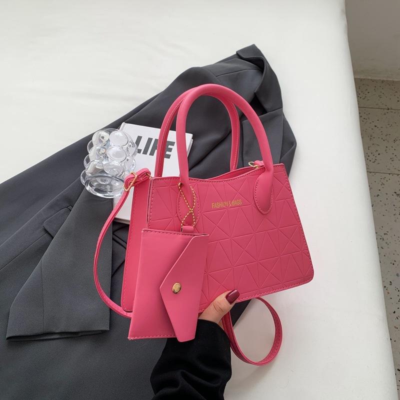 Kadın çantası 2025 yeni çocuk ve anne çantası PU kadın çantası Avrupa ve Amerikan büyük çanta çok parçalı set omuz çantası Bayan çantası