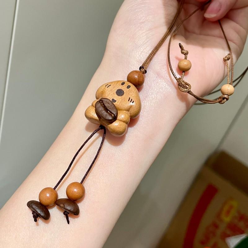 

Tiger Eye Wooden Little Bear Dog Necklace: Women s Cute Beaded Sweater Chain for Autumn/Winter.