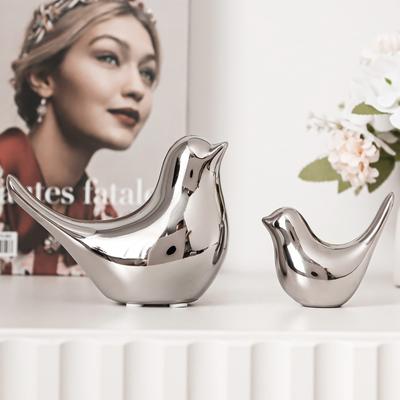 Figuritas de pájaros de cerámica plateados de lujo simple moderno, accesorios de decoración para el hogar, figuras de pájaros dorados, adornos decorativos para bodas