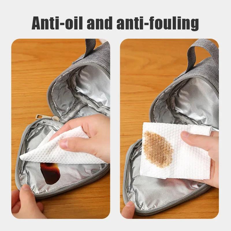 Hot selling mini new triangle insulation handheld bag, oil and dirt resistant inside, apply to student lunch, outdoor snack bag
