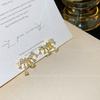 Light luxury niche zircon fringed pearl earrings, earclips, mosquito coil disc, fashion commuting, high-end silver needle earrings.