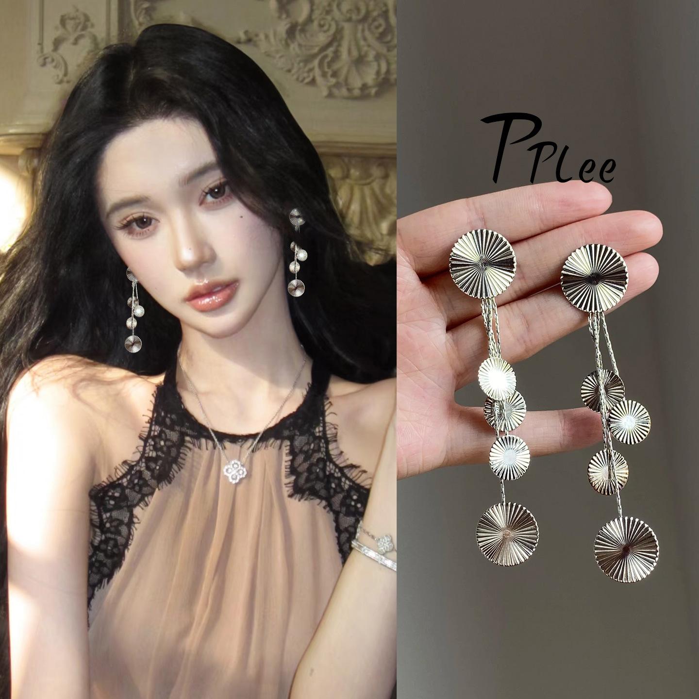 Silver needle round pattern fringed earrings European and American heavy industry metal cold wind studs light luxury high-end earrings