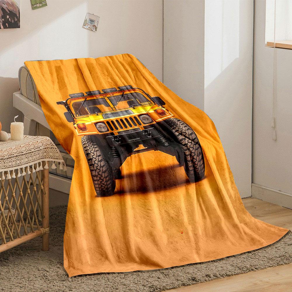 Front view of a bright yellow rugged vehicle against an orange background. for all seasons blanket lunch break throw gift