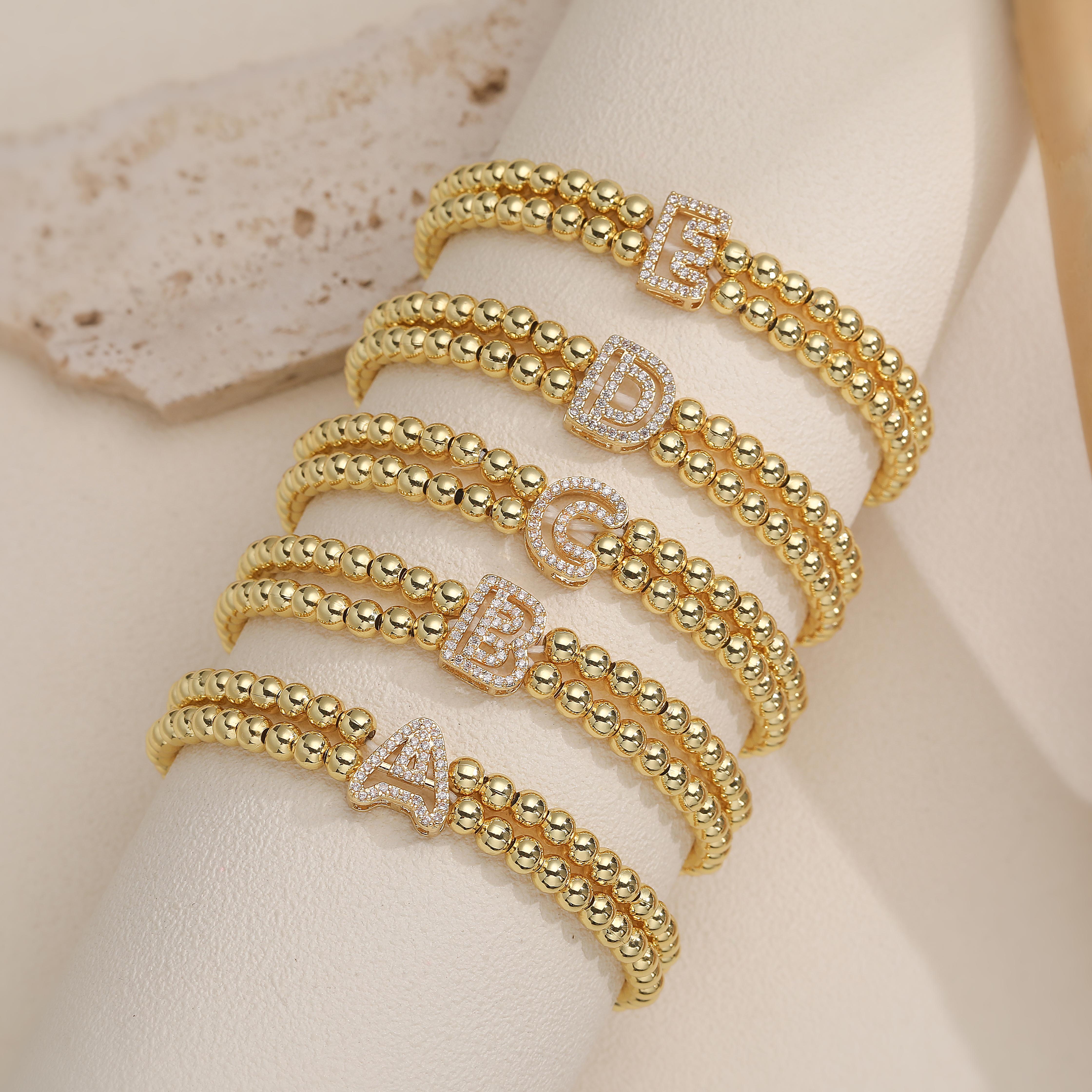 

HECHENG,Copper Metal Initial A-Z Double layer Elastic Bead Bracelet Simple Fashion Personalized Neutral Zircon 1 Piece A золотой