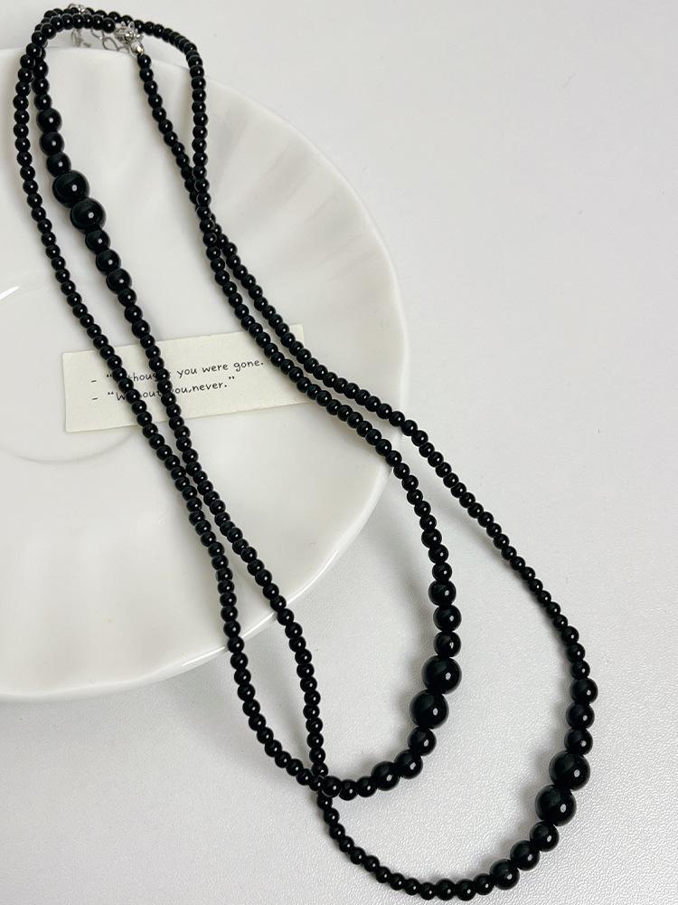 Irregular multi-layer stacking wearing long pearl necklace French light luxury temperament sweater chain simple high-end neck chain tide