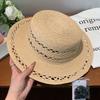 New hollow flat top Lafite straw hat women's summer new seaside beach sun hat French elegant straw top hat