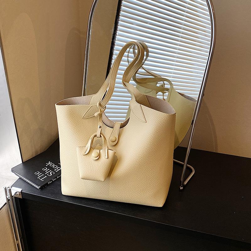 Simple and casual high-end single shoulder axillary commuting big bag for women's summer new large-capacity tote bag