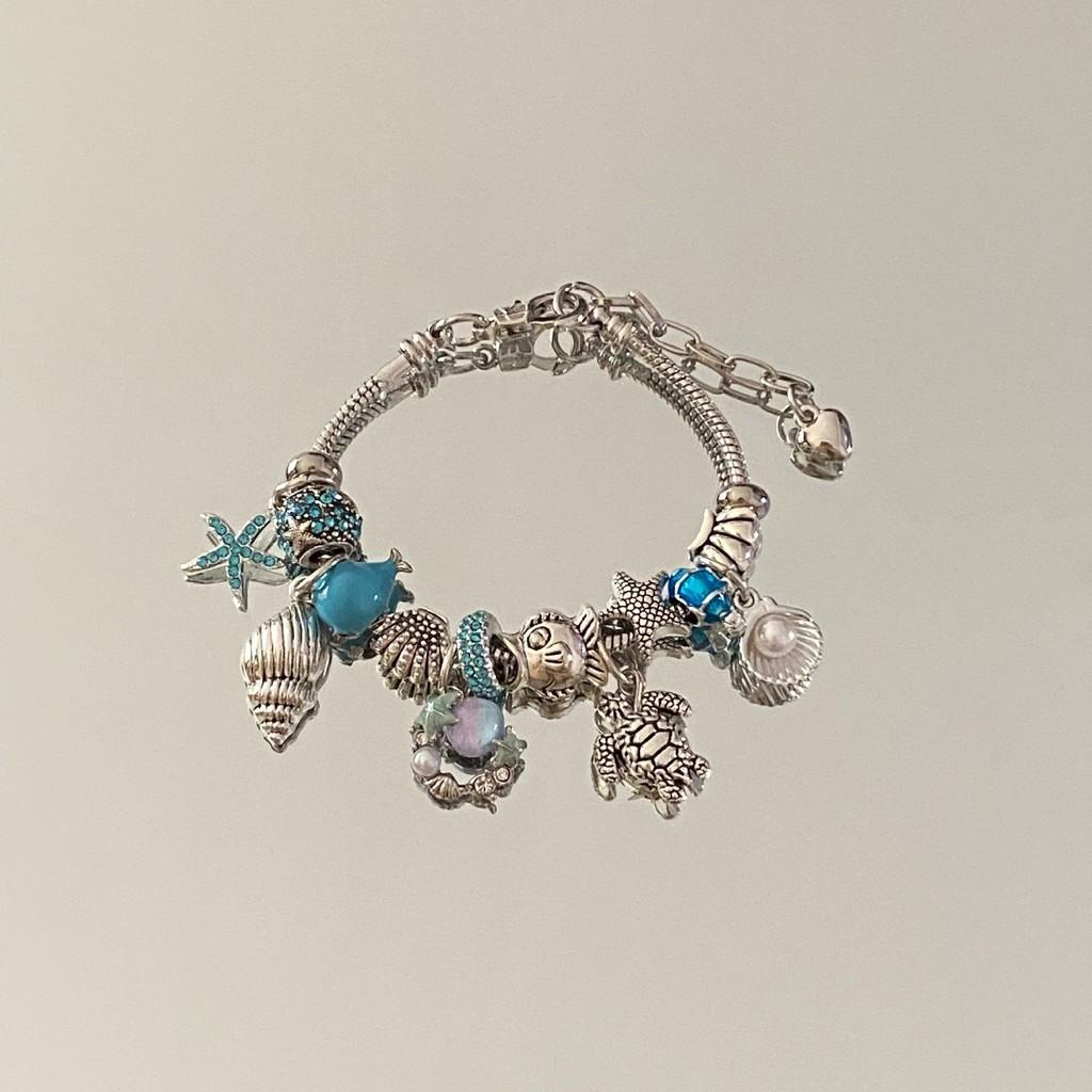Bracciale con Ciondolo Stella Marina e Conchiglia per Donna e Uomo con Perline Stile Oceano