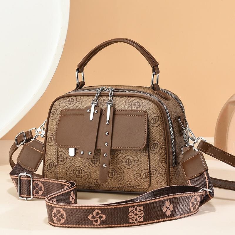 Popular women's bags, new trendy and high-end mother portable small round bags, classic foreign style old flower wholesale