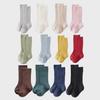 Trendy Spanish Children's Solid Color Mid-Long Socks for Babies, Students, and Sports Enthusiasts
