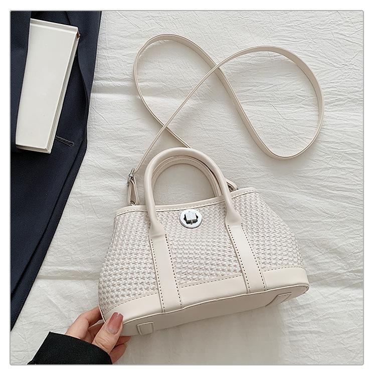 Contrasting color splicing woven handbag women's 2025 summer new retro messenger bag Korean niche design bucket bag