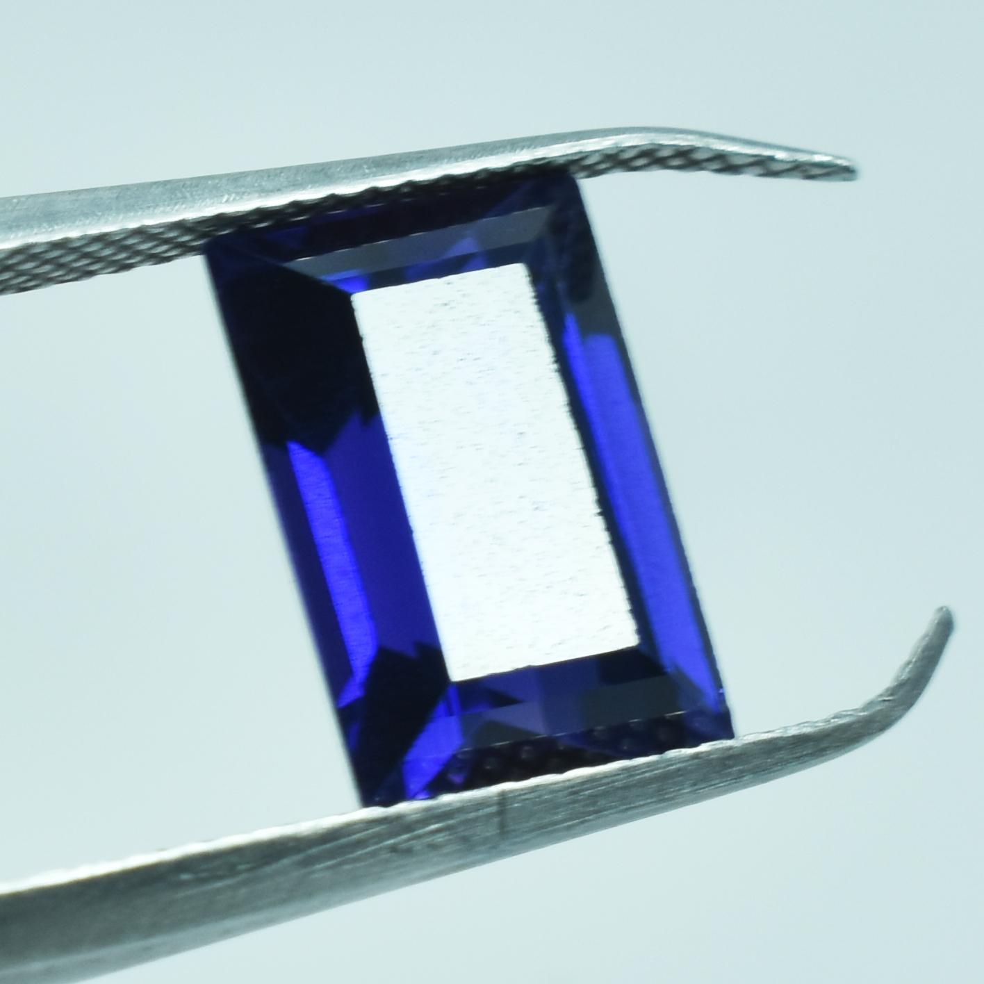 

Natural CERTIFIED Purple Tanzanite 4.85 Ct Emerald Cut Loose Gemstone SU-753 10.4 mm approx фіолетовий