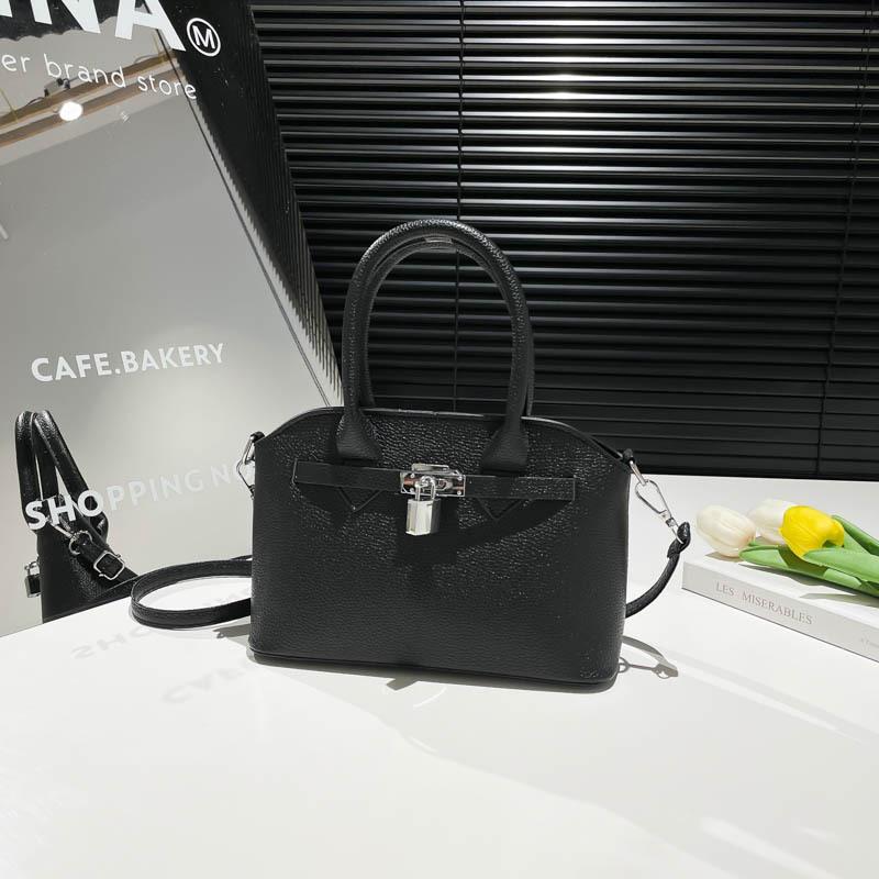 

Casual new niche commuter Kelly bag female design sense advanced summer simple retro versatile messenger bag чорний