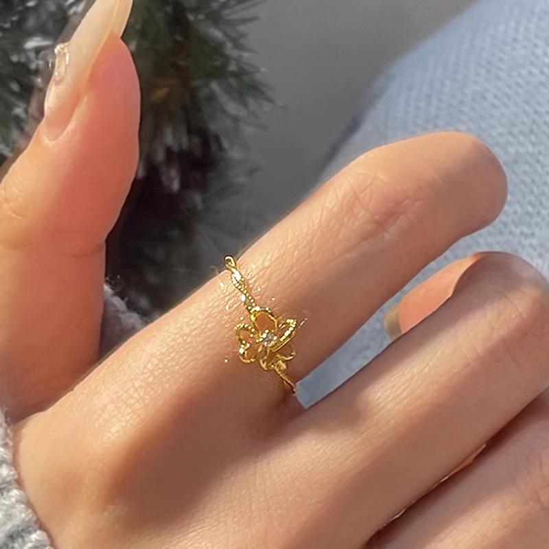 Xiaohongshu Chic Hollow Flower Bud Ring with Rhinestones - Elegant, Delicate, and Stylish Gold Accessory. Adjustable