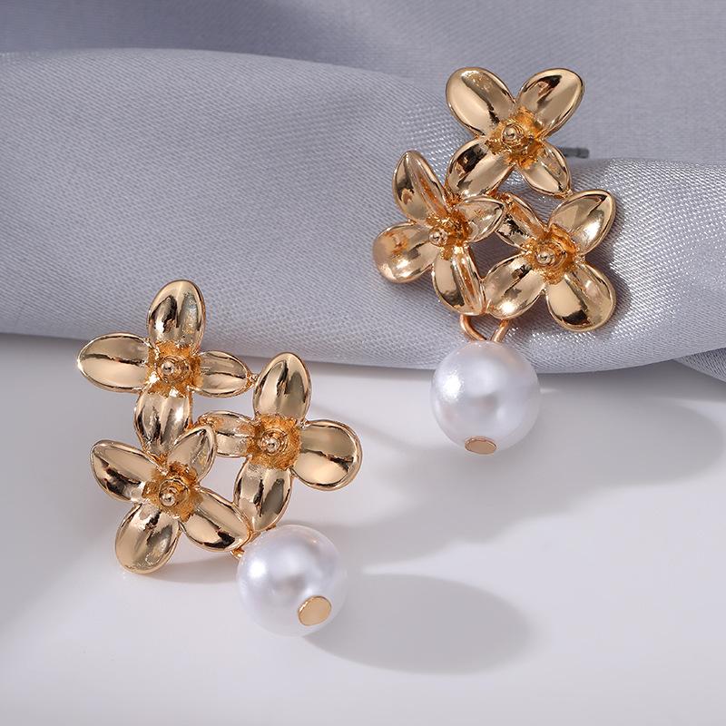 Floral temperament stud earrings Lily flower high-end earrings Women's imitation pearl geometric earrings