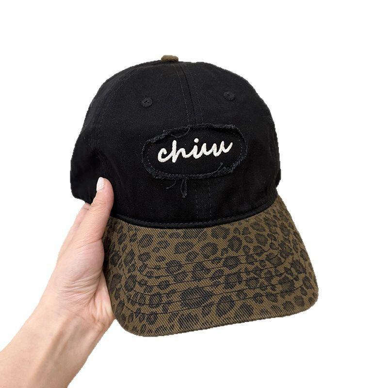 Korean retro-style leopard print baseball cap, a versatile and stylish accessory for women, offering sun protection and a color-blocked design that