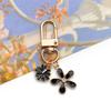 "Set of 30 Black Flower DIY Korean Jewelry: K-Gold Oil Drop Alloy Pendants for Earrings & Bracelets"