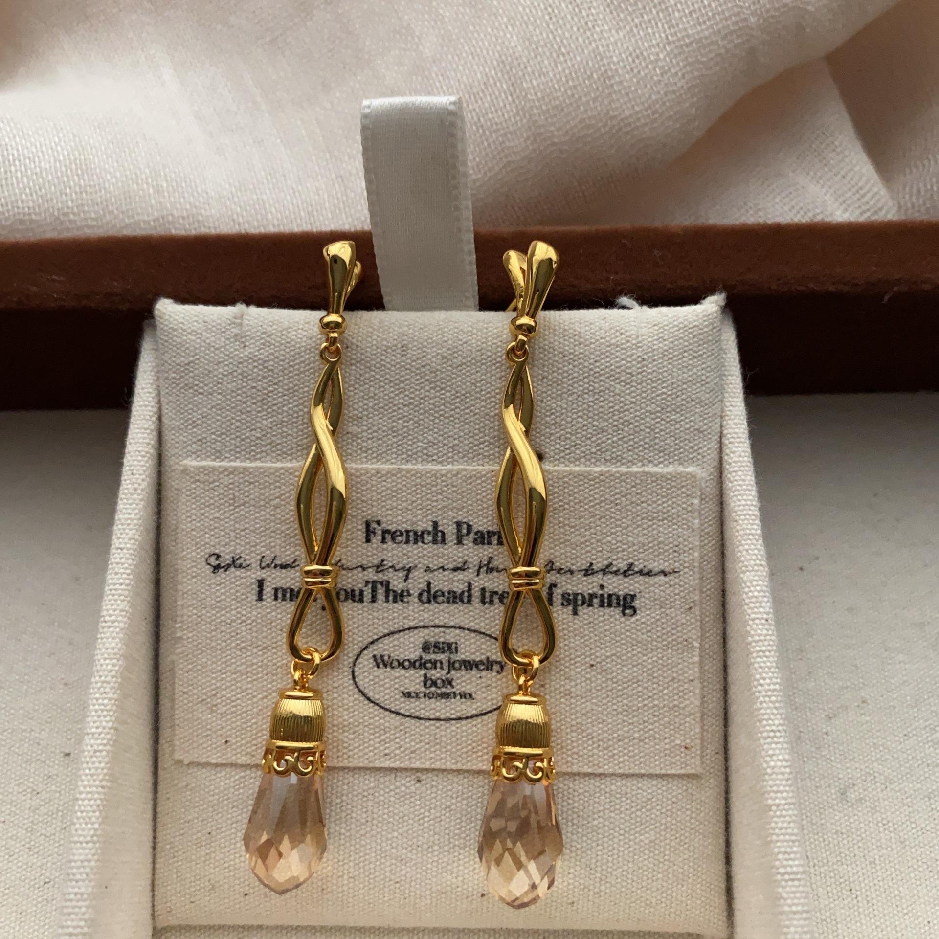 Customized retro twisted silk, water drop gemstone earrings, earrings, tassel, fashionable, exquisite, elegant, light luxury, bright niche models