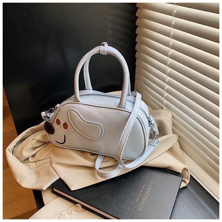 Retro underarm small bag women's new fashion suede matte shoulder bag cute puppy baguette bag