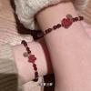 Here's a small red flower for you: a hand-woven bracelet made of cinnabar red garnet, the same style as the one featured on Little Red Book