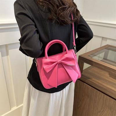Sanfte und modische Damenhandtaschen, einfache Handtaschen mit Schleife, 2025 Frühling und Sommer neue einfarbige koreanische Version Schulter-kleine quadratische Tasche