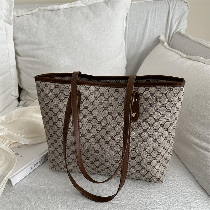 Bag women's personality new trendy niche design simple hand shoulder bag large capacity tote bag