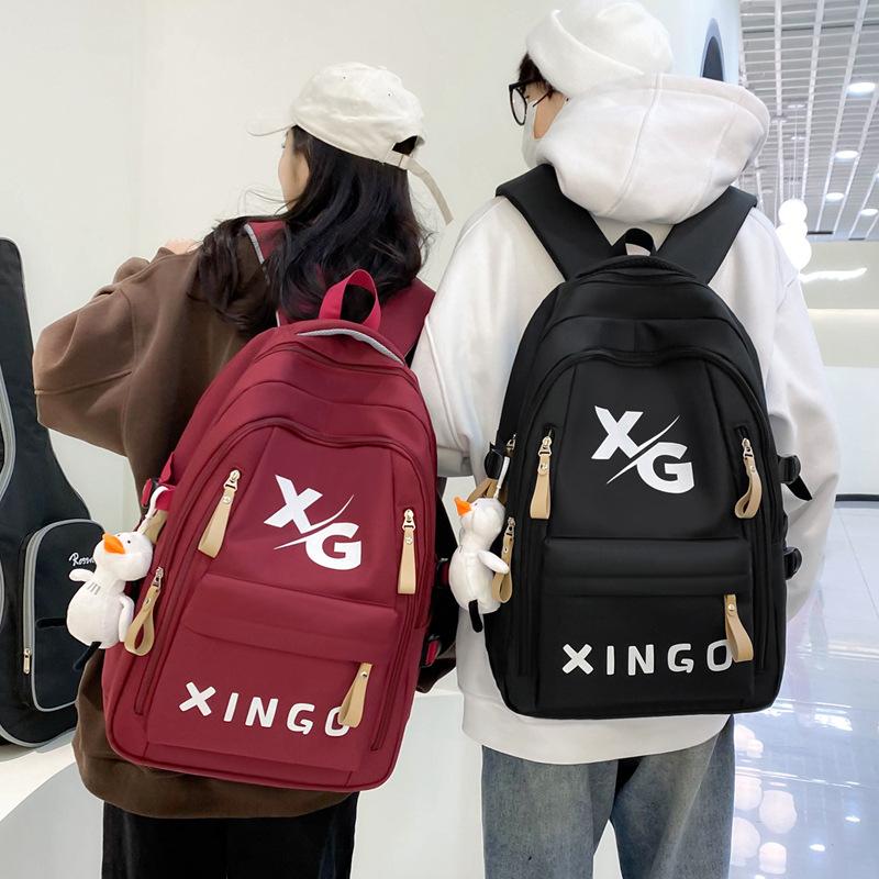 Schoolbag1011 new large-capacity backpack to reduce the burden of small, medium and early college students schoolbags, street trend travel bags,