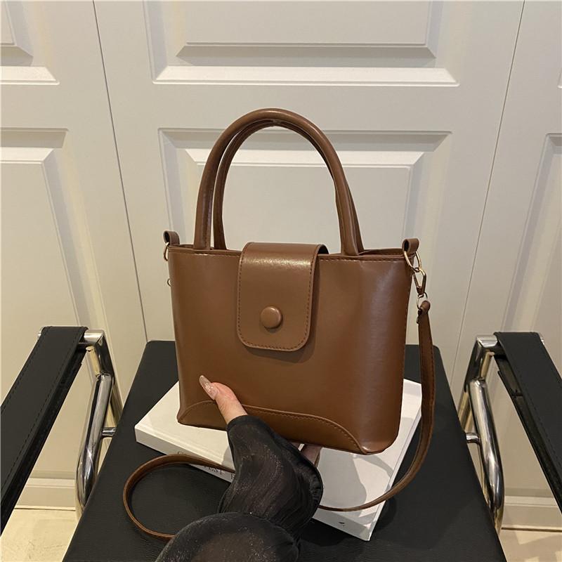 

Премиальная простая нишевая модная женская летняя новая сумка-ведро на одно плечо через плечо женская сумка коричневый