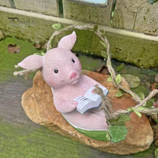 Durable Outdoor Decoration Hanging Resin Pig Figurine, Cute Piggy Lying in Hammock Reading Waterproof Ornament Book Ornament, Animal Sculpture