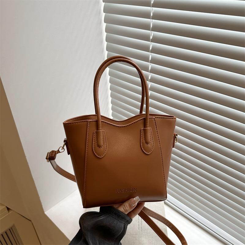 Contrasting color handbag bag women's summer new simple casual shoulder bag popular bucket bag