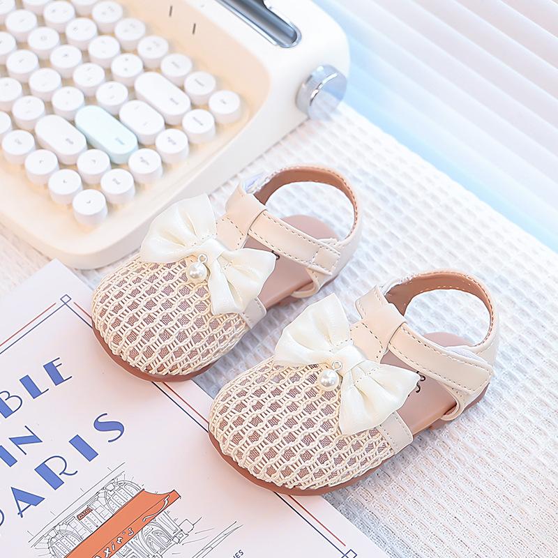 

Girls fashion woven bow sandals 2025 summer new versatile casual shoes children s soft-soled foreign-style beach shoes 50 pairs of 21-25 yards in a whole box