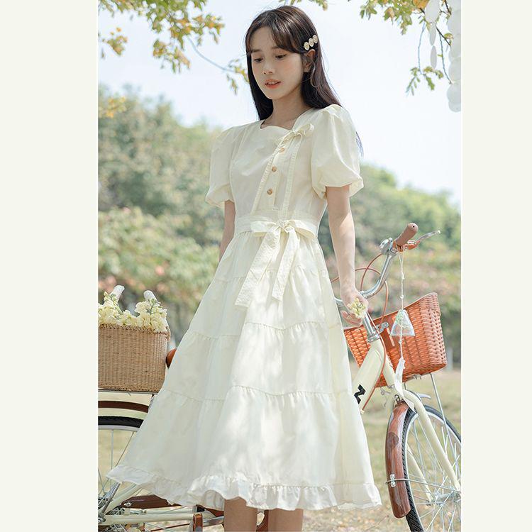 Retro Sommerkleid mit Puffärmeln, Schleifenbändern und taillierter Taille