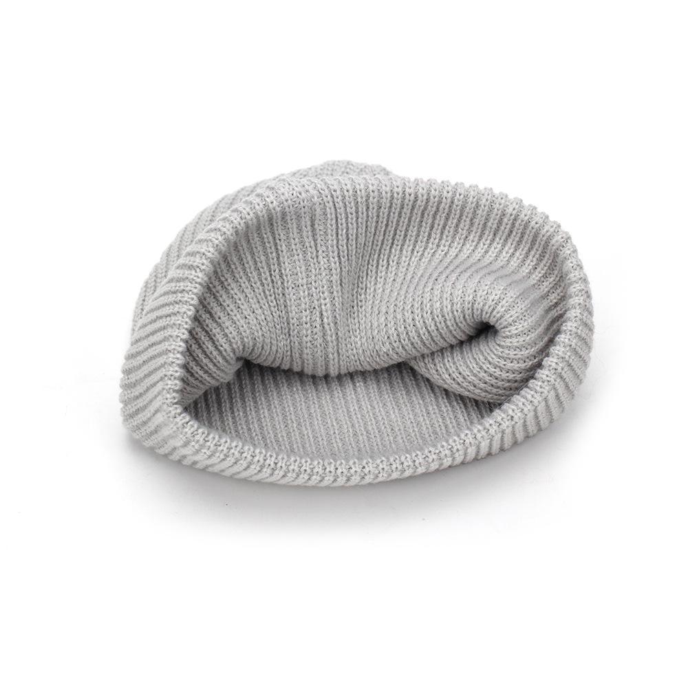 New solid color flower jacquard hat women's autumn and winter warm wool hat Internet celebrity windproof hat manufacturer knitted hat