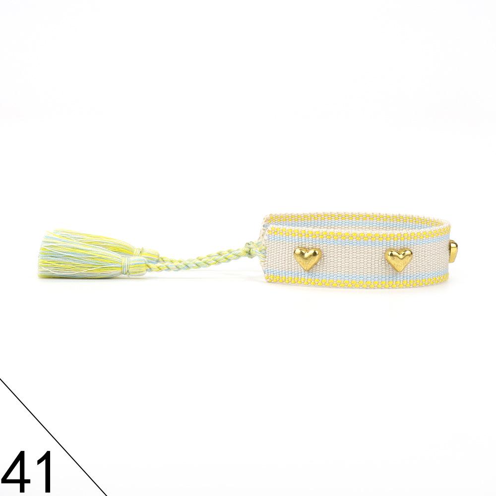 European and American Rivet Metal Heart Tassel Woven Bracelet for Women