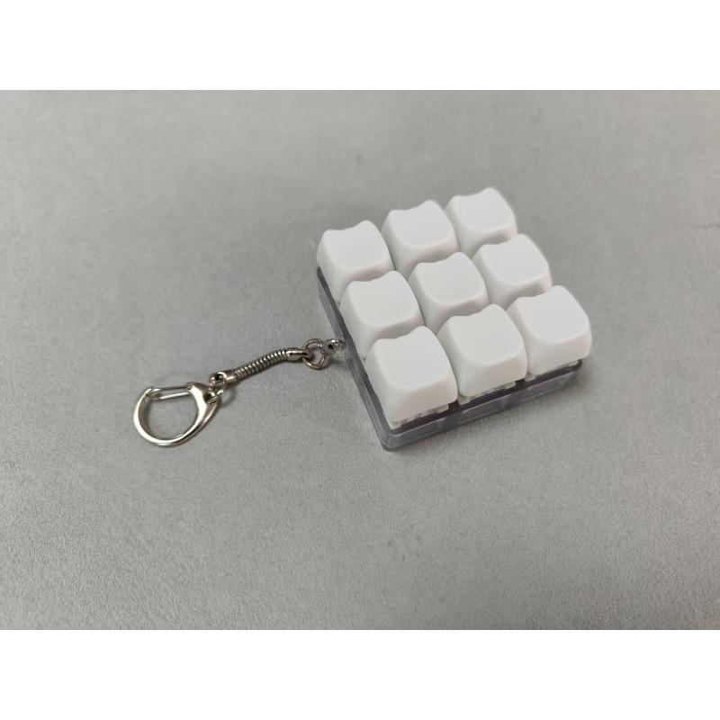 

Decompression round hat decompression button 9-key shaft tester keyboard cat keychain finger pinch decompression toy pendant no light (silicone rope)