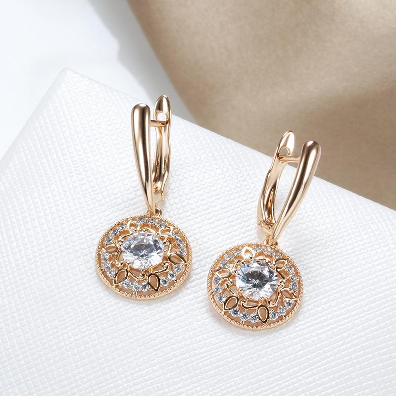 Autumn and winter fashion micro-inlaid zircon ear buckle 585 rose gold hollow flower earrings women