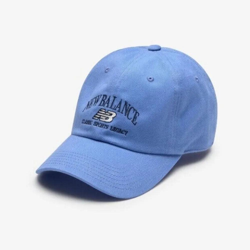 [New Balance] Cap OQK NBGDFS1111-50 Heritage Arch Graphic Ball Cap blue tones