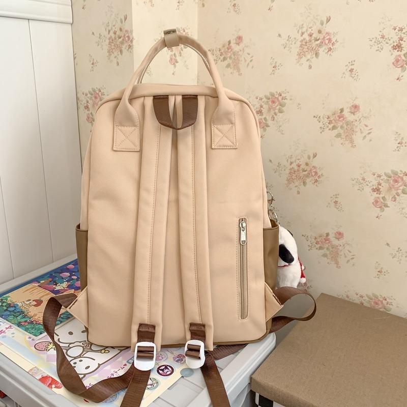 New high-value and lightweight schoolbag for junior high school students, college students, niche contrasting colors, portable backpack for women