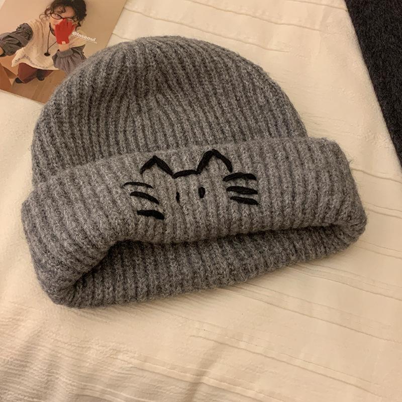 Cute cat embroidery blue knitted women's new sweet and versatile face small warm ear protector wool hat