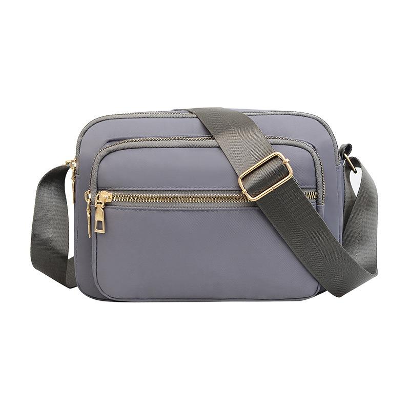New Oxford cloth bag women's bag lightweight anti-splashing shoulder messenger bag mother bag mobile phone change cashier bag